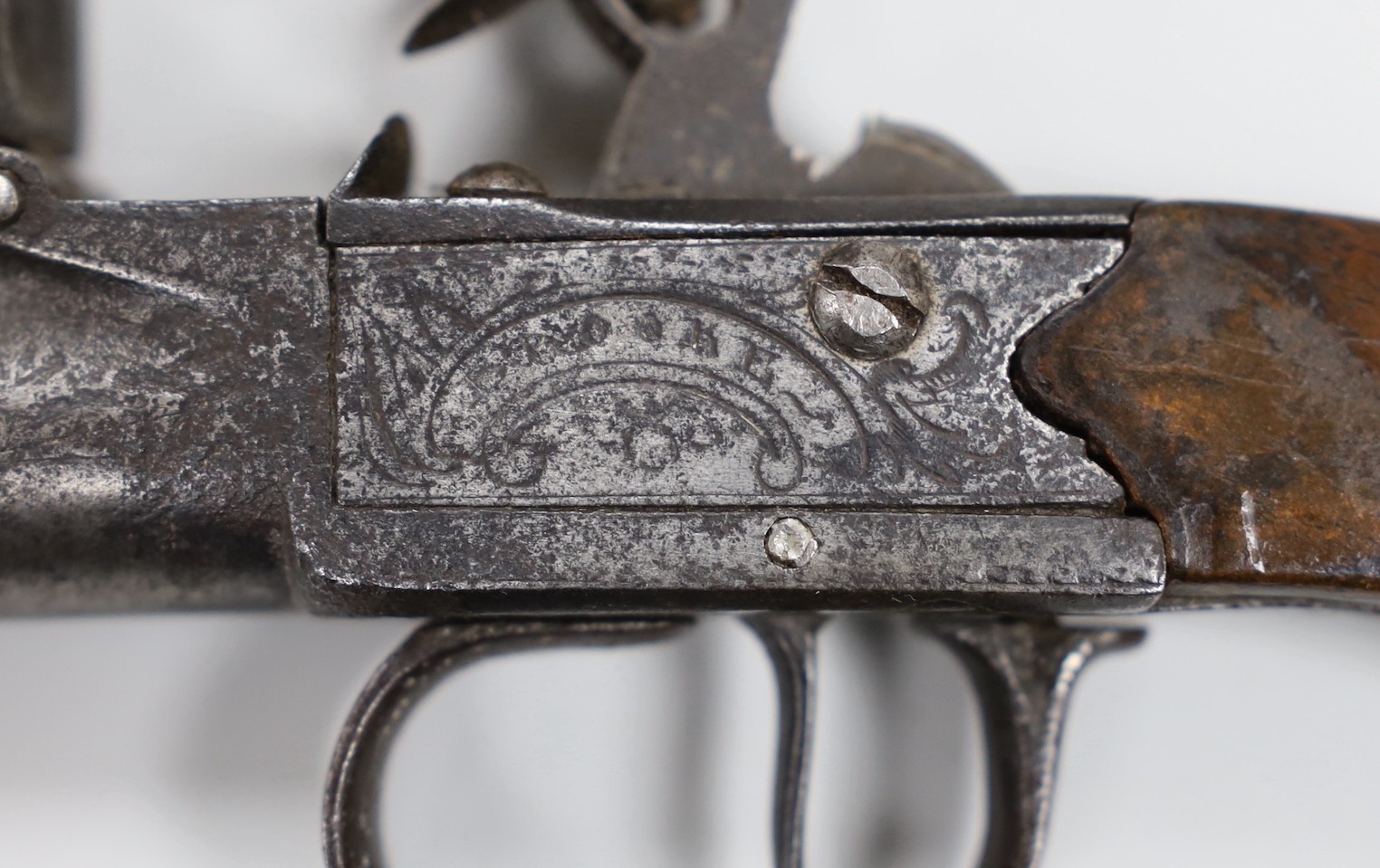 A Georgian flintlock pistol, the lock engraved ‘Brooke London’ and receipt